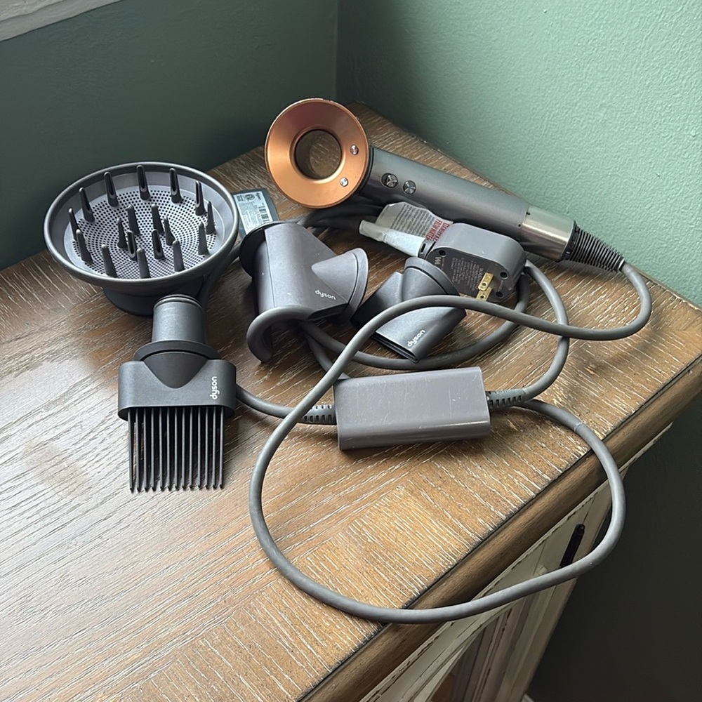 Dyson supersonic hair dryer with attachments